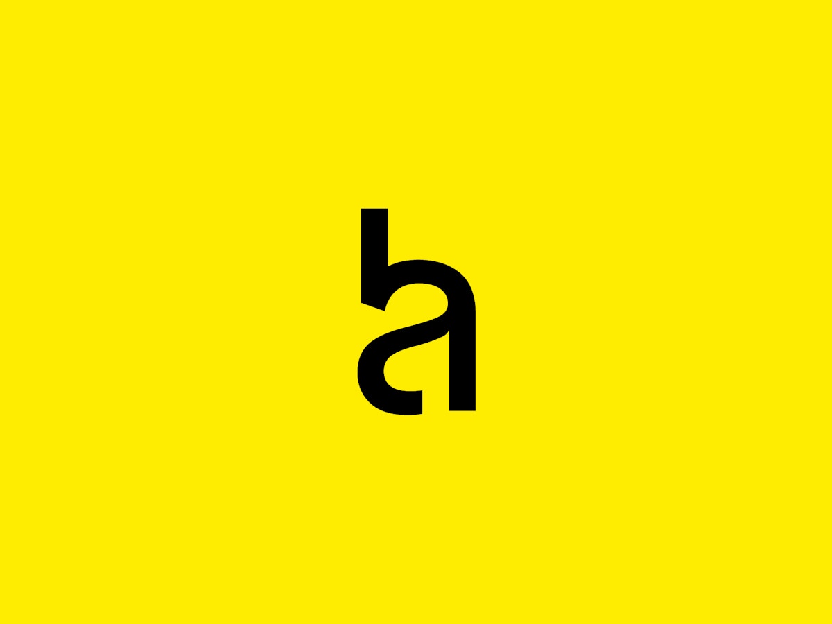 Hoskins Architects logo in black on a yellow background.