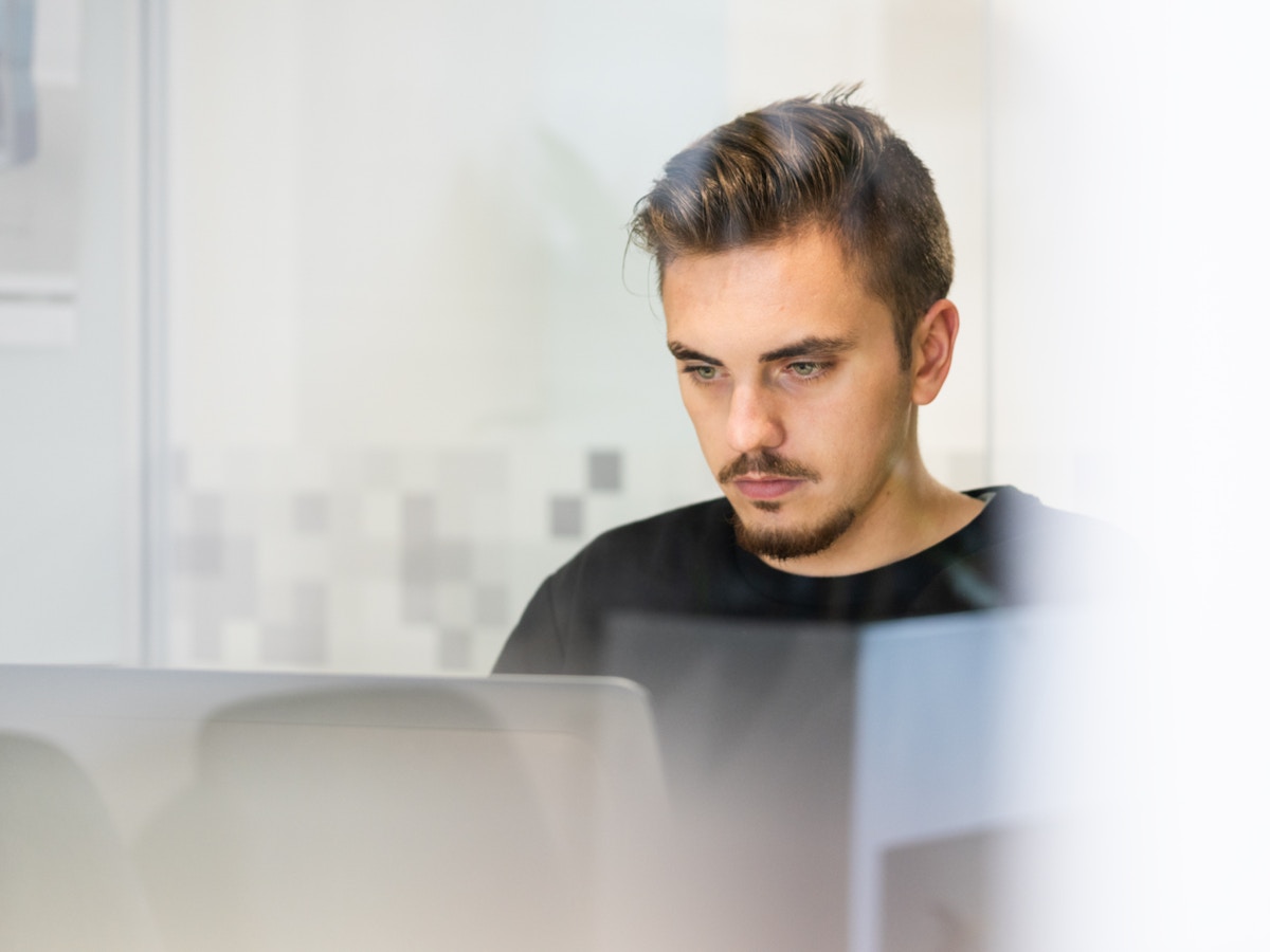 Man looking at computer screen