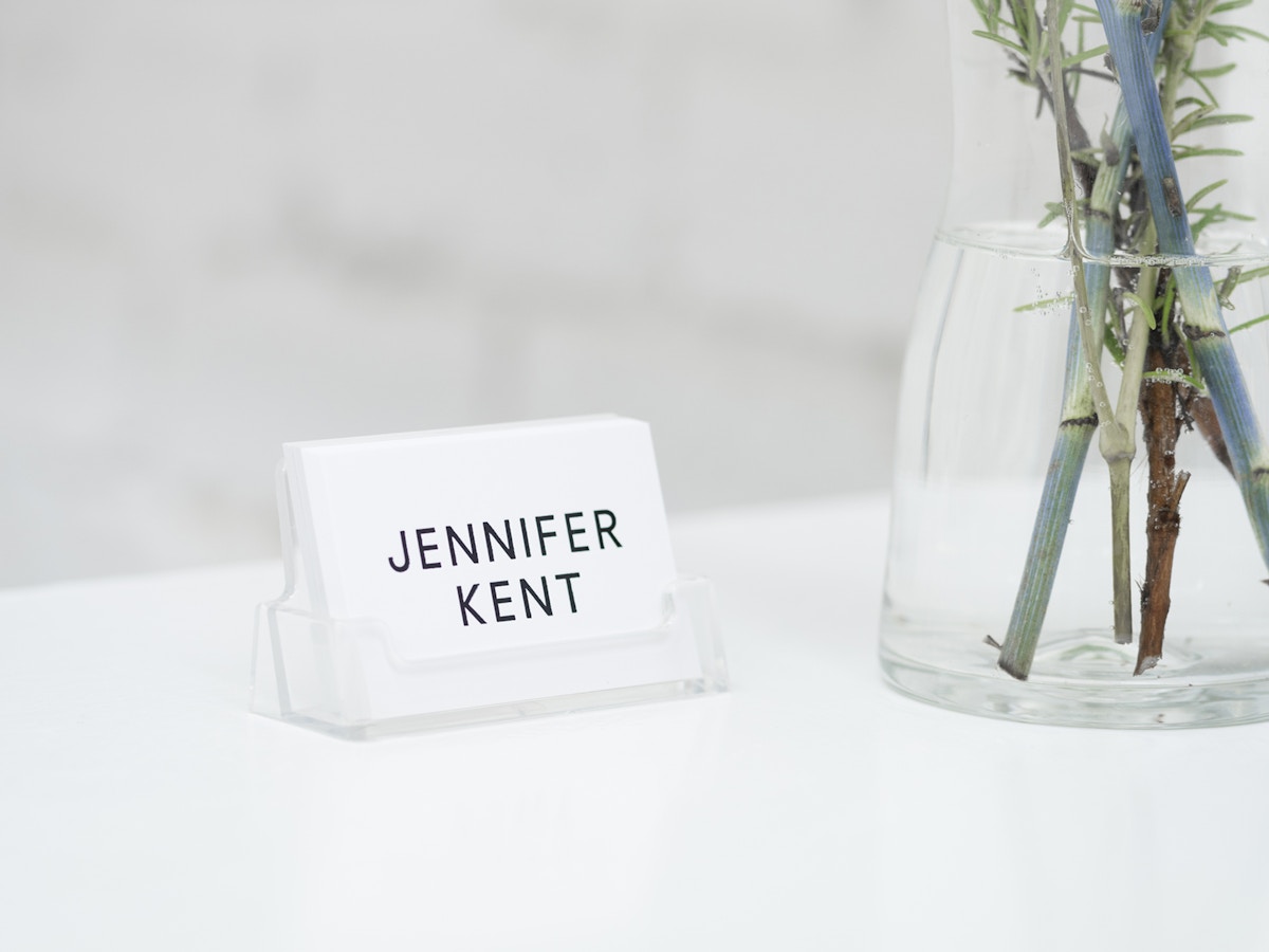A white business card that reads "Jennifer Kent" in black text.